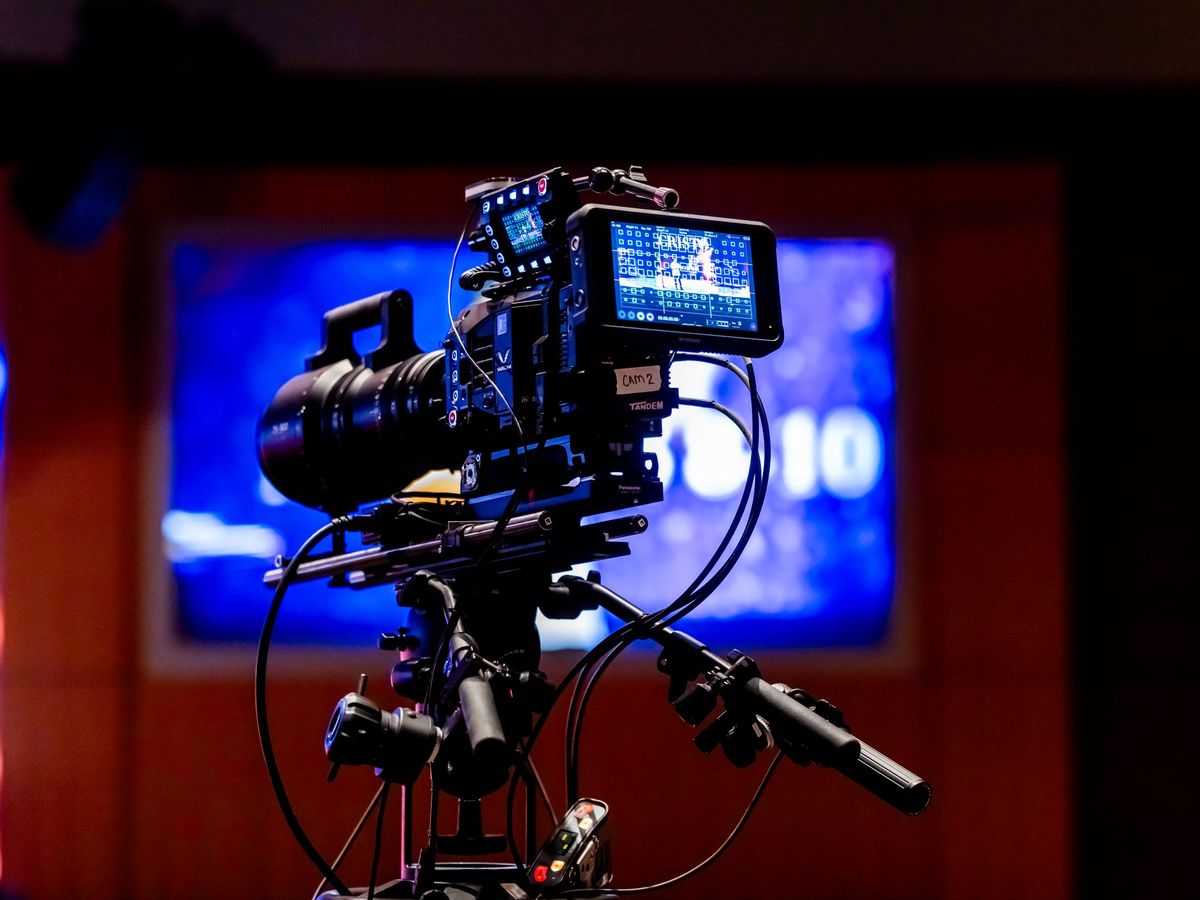 Cinema camera rig on a tripod in a television studio